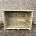 Angus Logs - Giant Log Store viewed straight on from the open front, showing the full interior storage space and slatted base